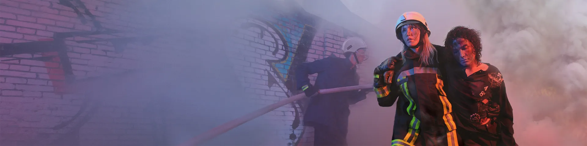 Women firefighters putting off a fire